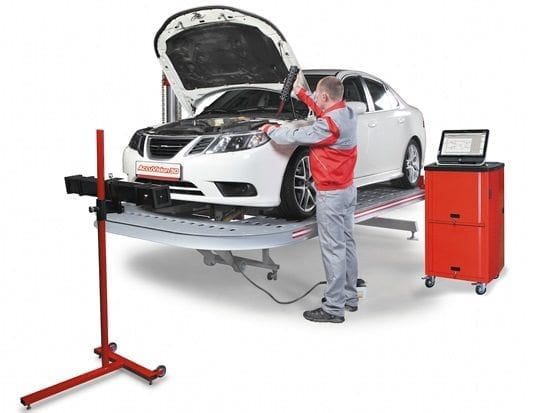 A mechanic works on a car using the AccuView system